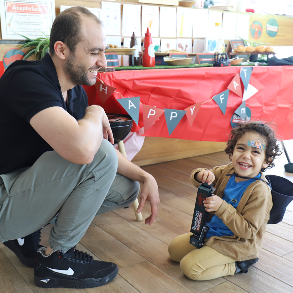 Kids Club Macquarie Park | Fathers Day Bunnings Table with Dad and Child | Premium Childcare