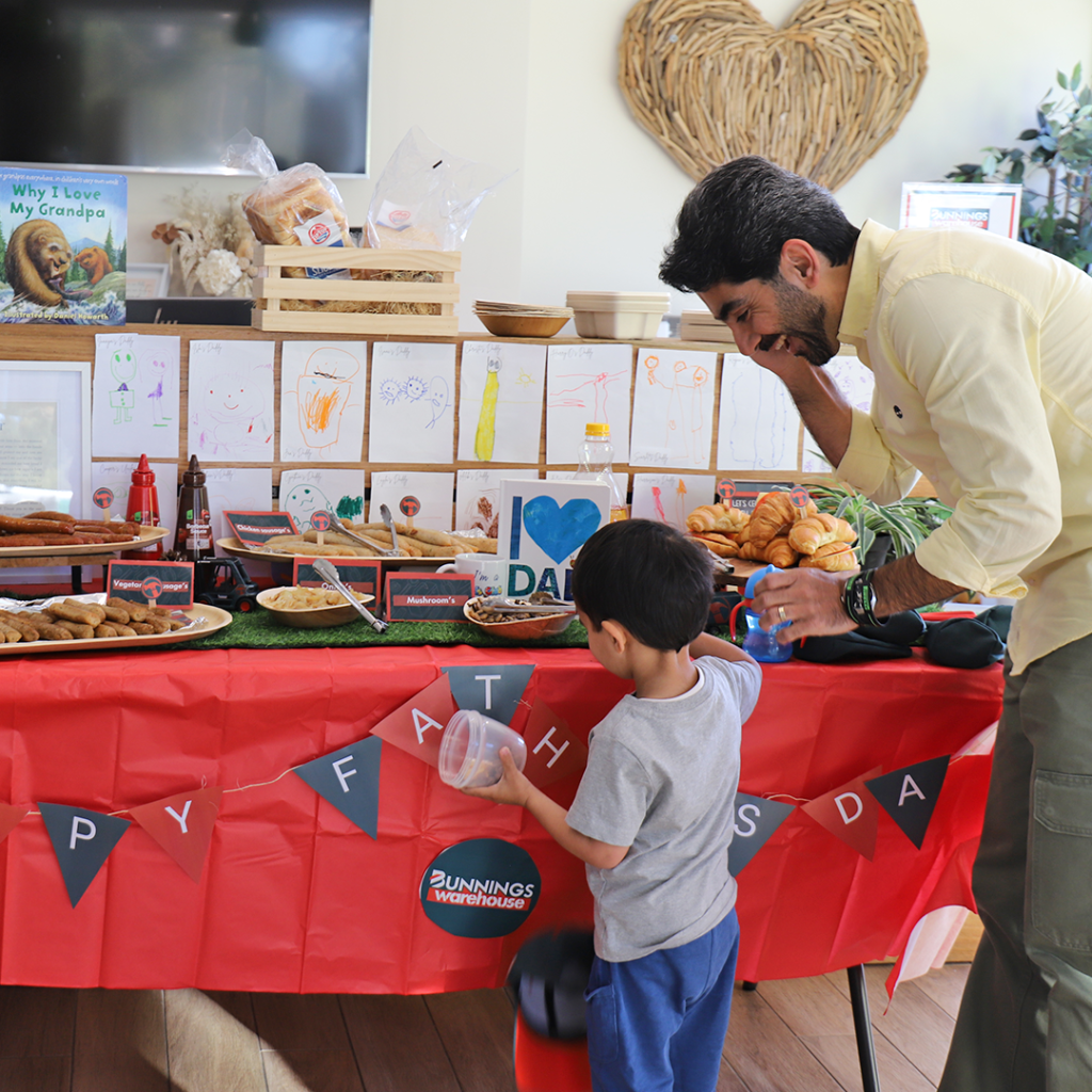 Kids Club Macquarie Park | Fathers Day Bunnings Table with Father and Son | Premium Childcare