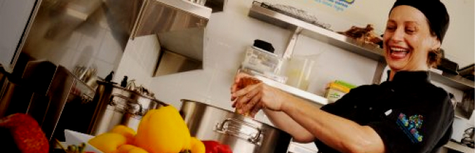 Column image Childcare centre chef preparing fresh meals in early learning kitchen