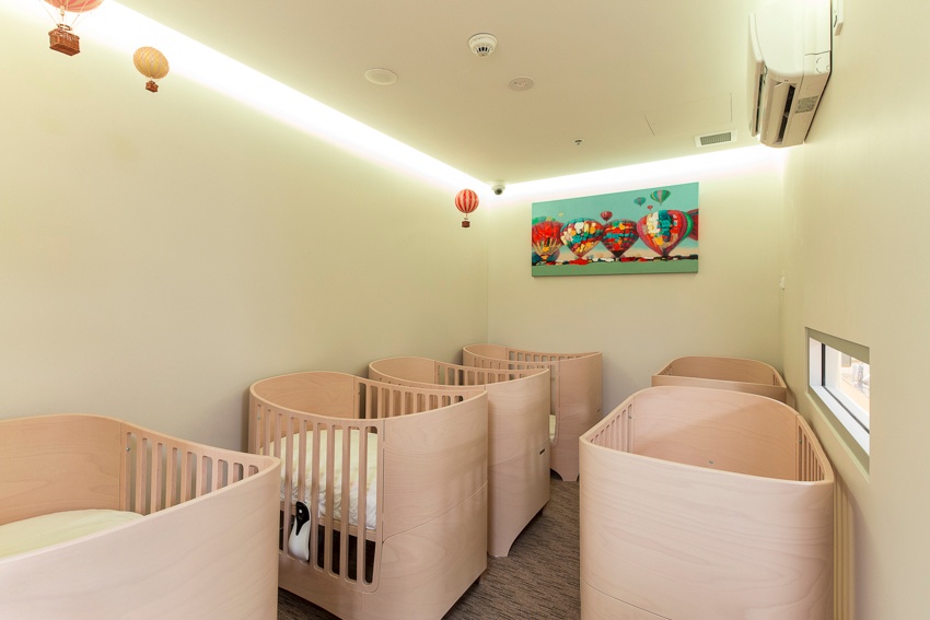 Column image Calm baby sleep room with cots at Kids Club Elizabeth Street childcare centre