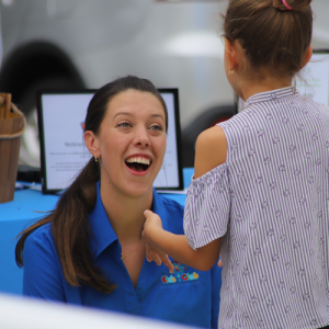Column image Kids Club Childcare Centre educator engaging with a child during a positive and caring interaction.