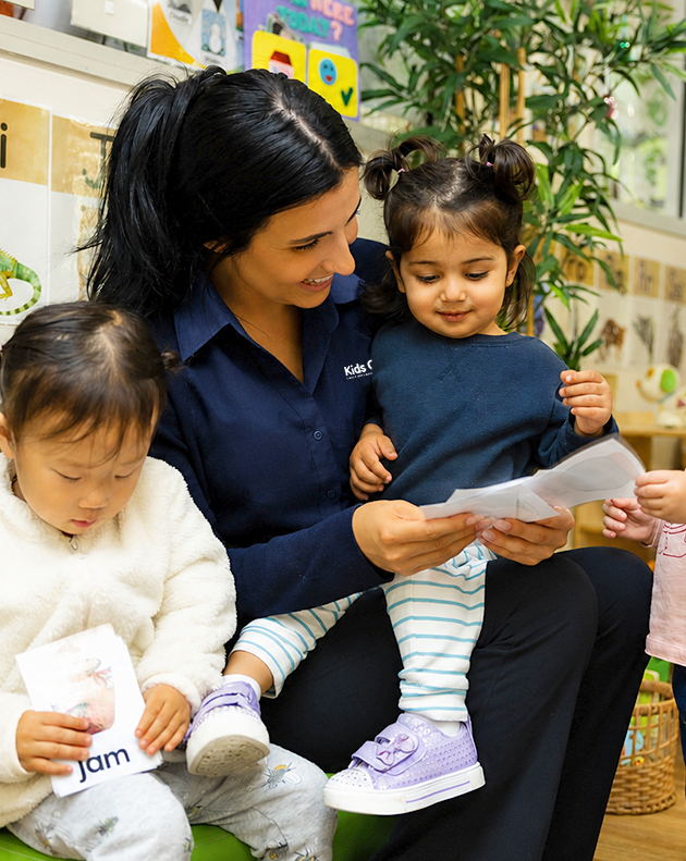 Column image Kids Club Educator Reading to Child